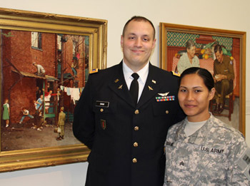 First Lieutenant Andrew Shaw and Sergeant Kelsey Shaw, view Rockwell's "Homecoming" paintings, at the Museum's "Here at Home Homecoming" event in June 2012. 