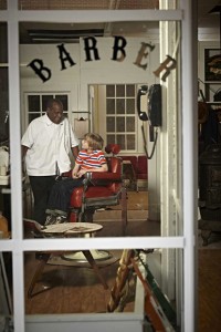 Photo of actors Danny Glover and Dash Pledger-Levine in a scene from the Hallmark Movie Channel's original movie, "Norman Rockwell's Shuffleton's Barbershop." Courtesy and ©Crown Media, all rights reserved.